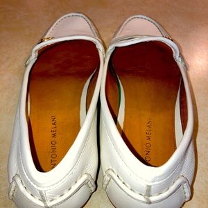 White leather loafers. Antonia Melani